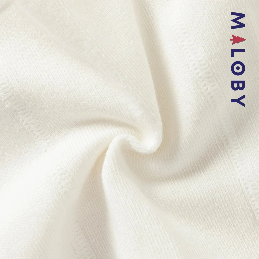 Collant épais fantaisie beige pour petite fille, idéal pour les vêtements enfants.