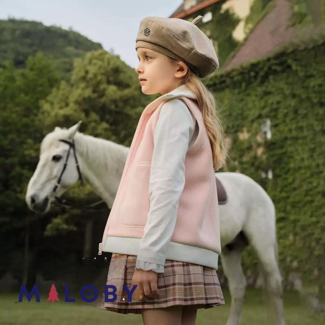Veste sans manches en sherpa enfant fille rose, idéale pour les vêtements anti-allergiques.