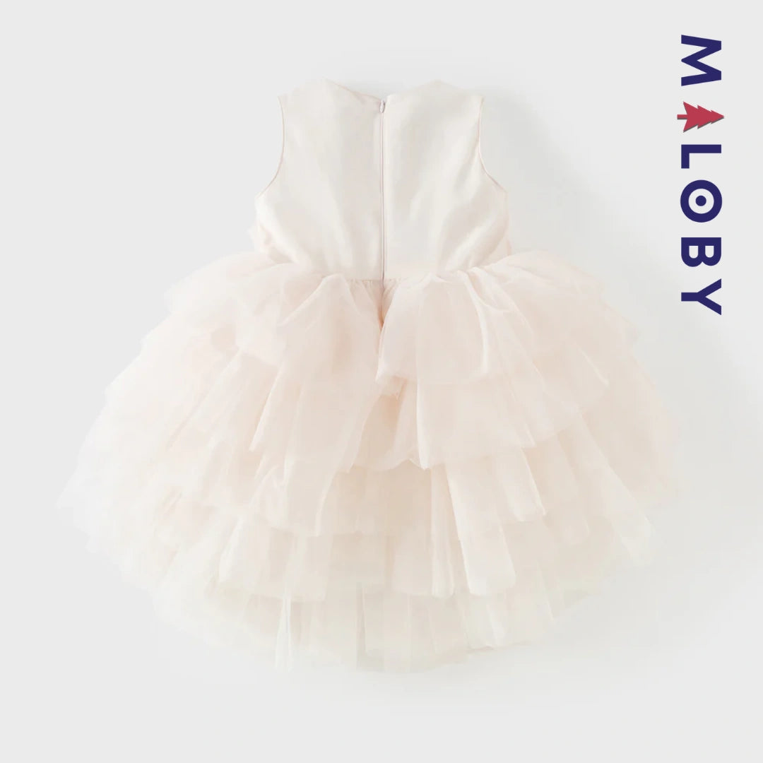 Robe de princesse d'été rose tendre , coupe trapèze, en tulle vaporeux.