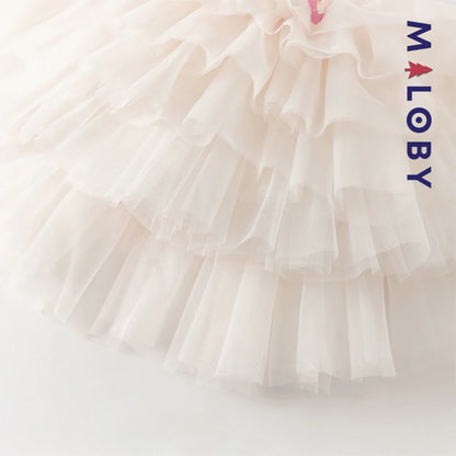 Robe de princesse d'été rose tendre , coupe trapèze, en tulle vaporeux.