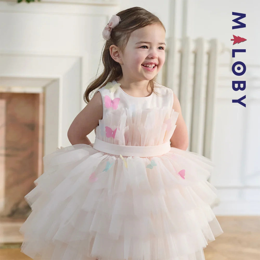 Robe de princesse d'été rose tendre , coupe trapèze, en tulle vaporeux.