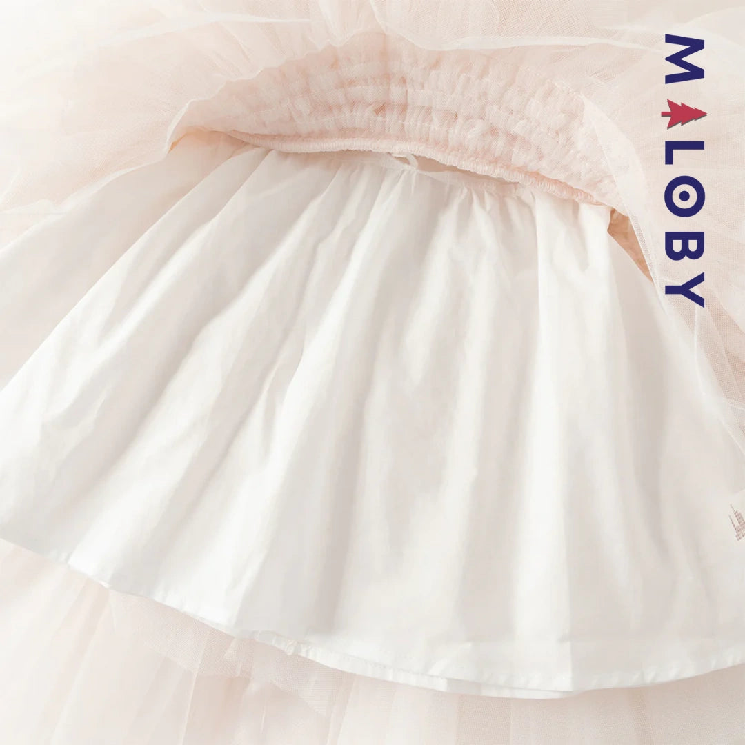 Robe de princesse d'été rose tendre , coupe trapèze, en tulle vaporeux.