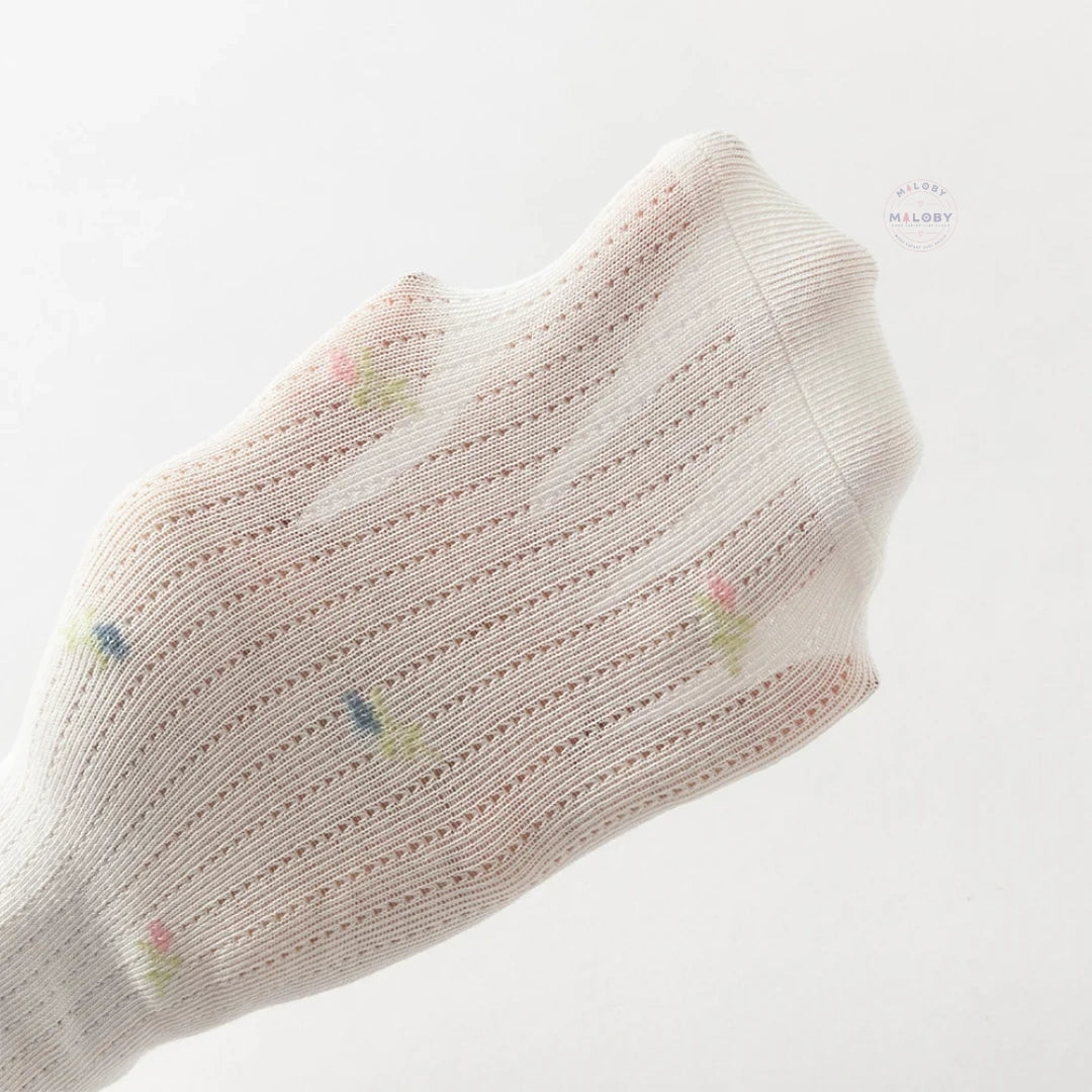 Collant en pointelle épais à motifs fleurettes enfant fille blanc - MALOBY