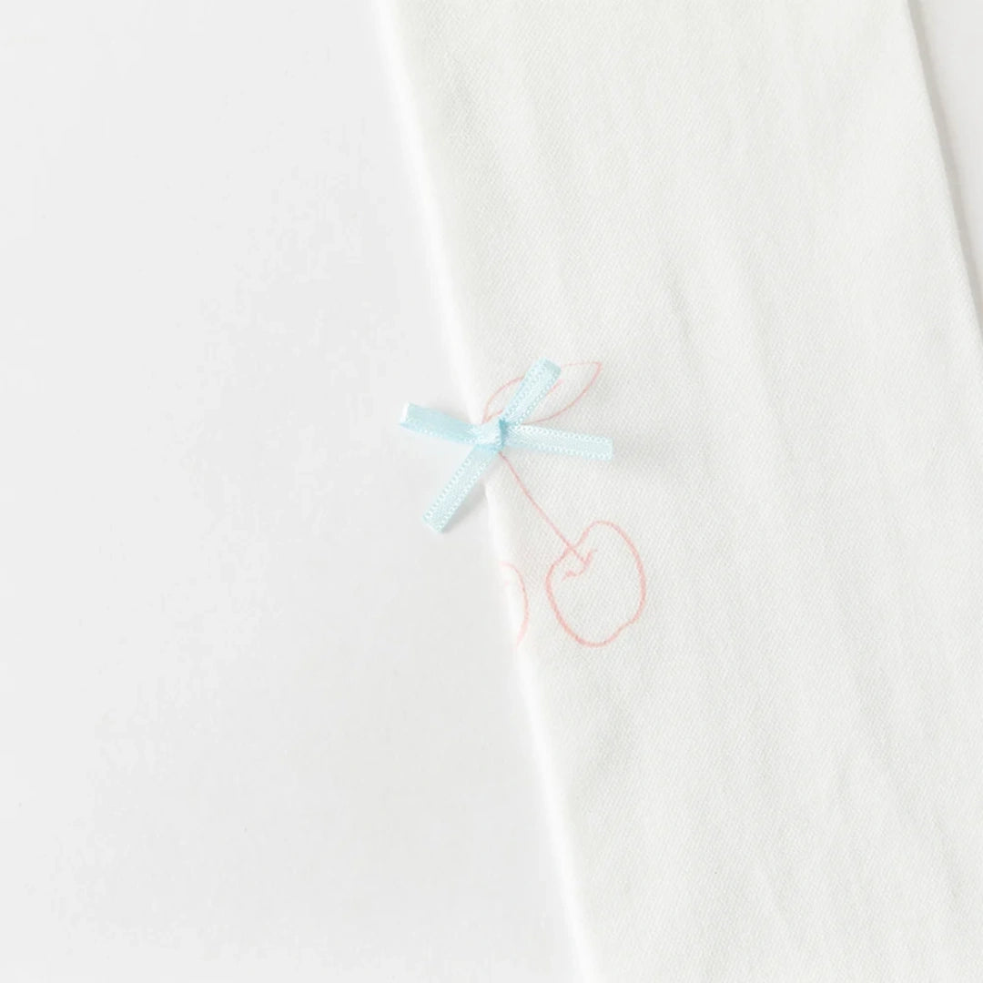 Collant en pointelle motif fleur enfant fille -Beige