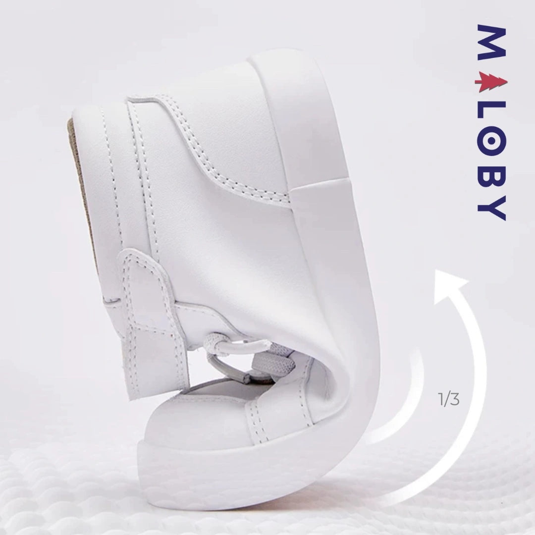 Baskets montantes blanches pour enfant garçon, idéales pour le quotidien et les occasions spéciales.