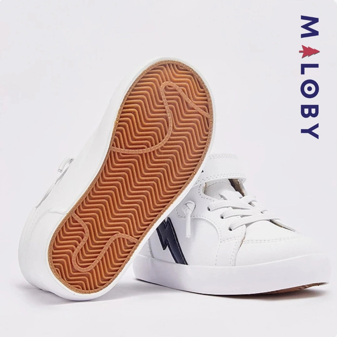 Baskets montantes blanches pour enfant garçon, idéales pour le quotidien et les occasions spéciales.