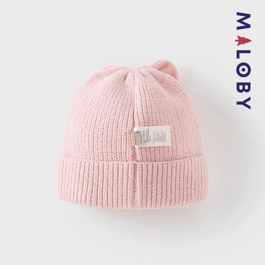 Bonnet en maille rose pour fille, accessoire tendance pour enfants au Maroc.
