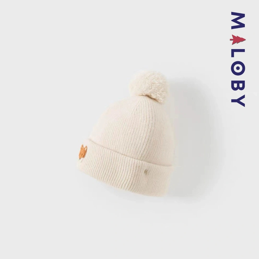 Bonnet en maille beige pour enfant garçon, accessoire tendance et confortable.