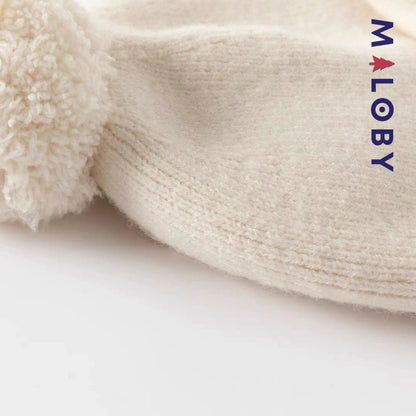 Bonnet en maille beige pour enfant garçon, accessoire tendance et confortable.