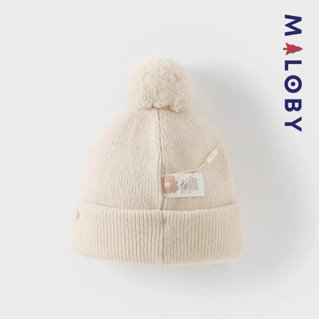 Bonnet en maille beige pour enfant garçon, accessoire tendance et confortable.