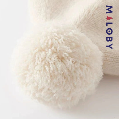 Bonnet en maille beige pour enfant garçon, accessoire tendance et confortable.