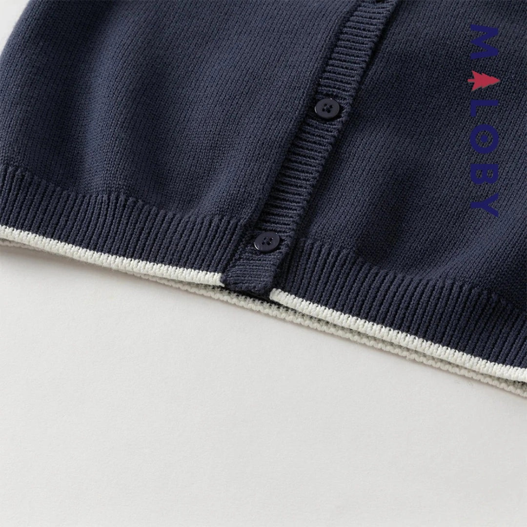 Cardigan à col claudine marine et violet pour fille, idéal pour les occasions spéciales.