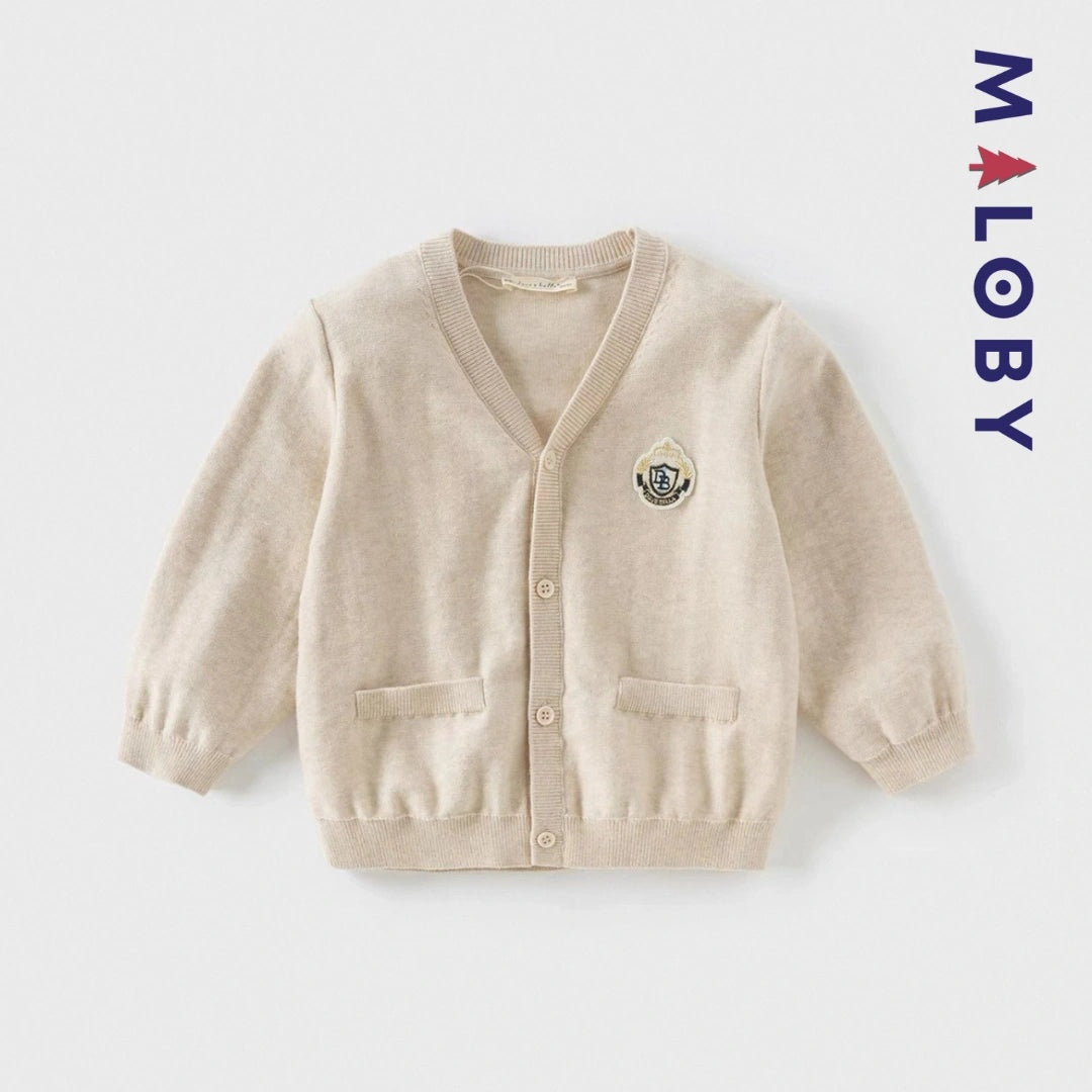 Cardigan en maille beige pour garçon, idéale pour les vêtements d'enfants et les occasions spéciales.