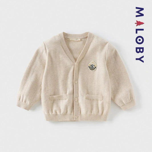 Cardigan en maille beige pour garçon, idéale pour les vêtements d'enfants et les occasions spéciales.
