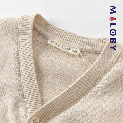 Cardigan en maille beige pour garçon, idéale pour les vêtements d'enfants et les occasions spéciales.