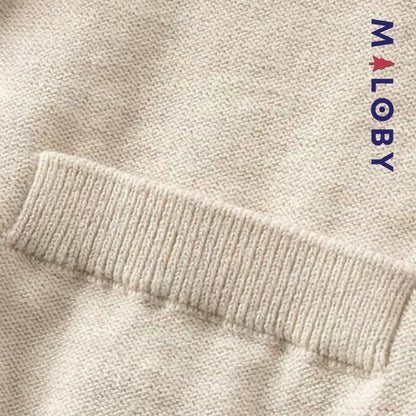 Cardigan en maille beige pour garçon, idéale pour les vêtements d'enfants et les occasions spéciales.