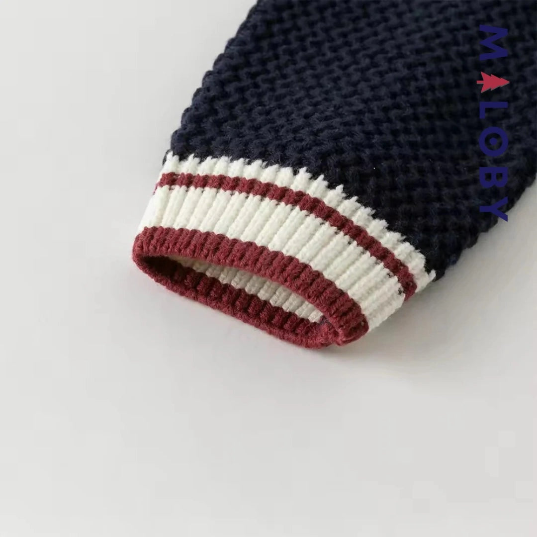 Cardigan en maille marine pour garçon, parfait pour les vêtements enfants au Maroc.
