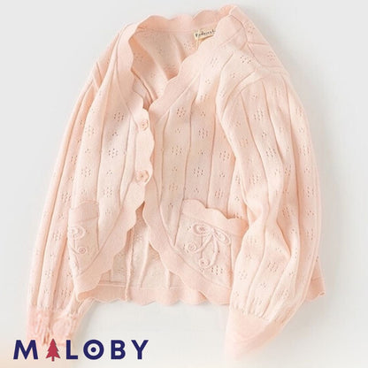 Cardigan en maille pointelle corail pour fille, parfait pour les vêtements enfants.