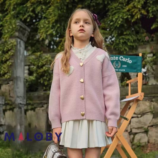 Cardigan mauve motifs cœurs irisés pour fille, idéal pour les vêtements d'enfants au Maroc.