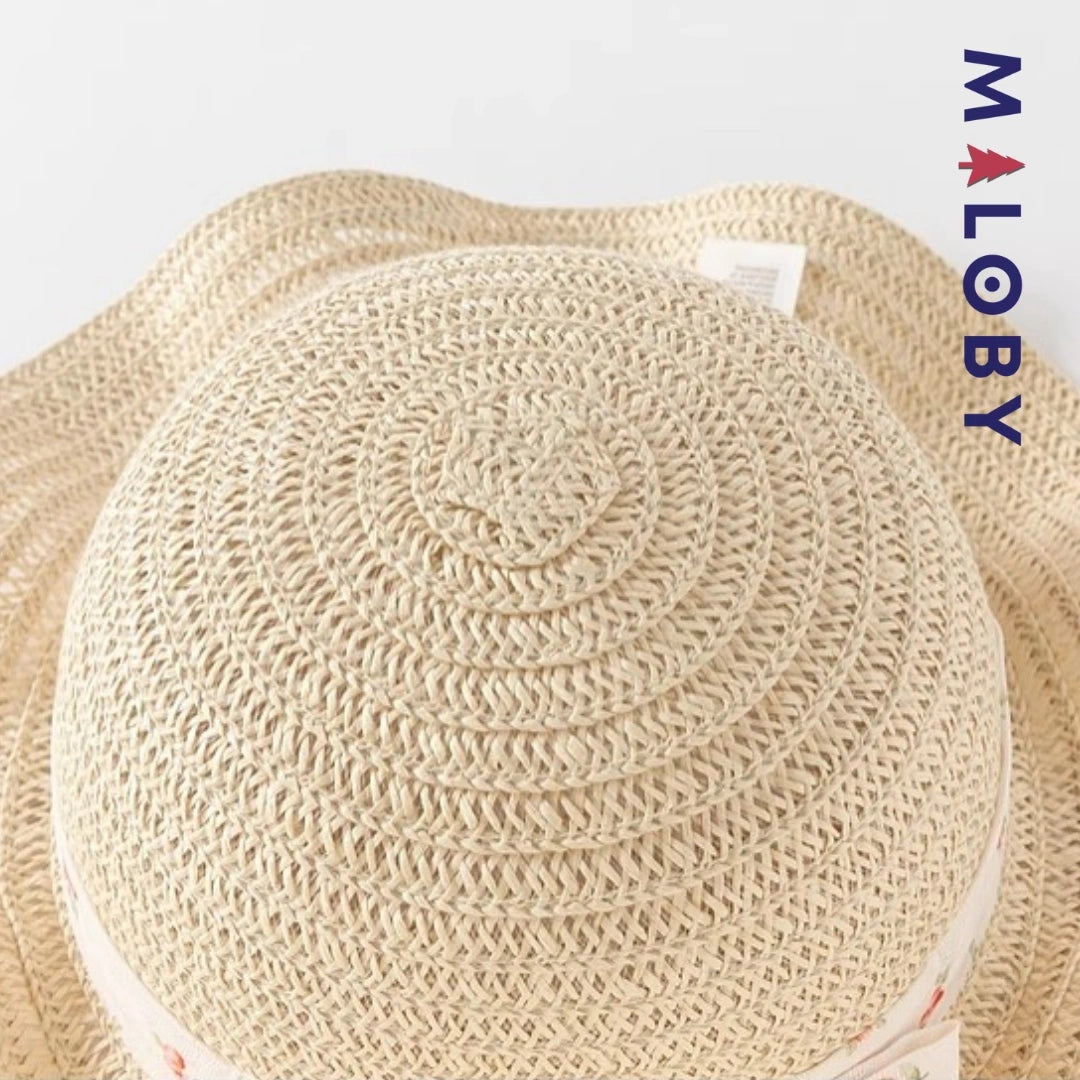 Chapeau en paille beige avec ruban floral pour enfant fille, parfait pour les anniversaires.