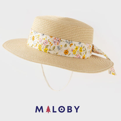 Chapeau aspect paille avec ruban imprimé pour enfant fille en beige, parfait pour les vêtements d'été.