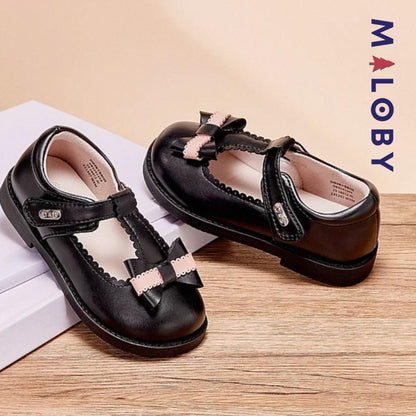 Chaussures noires à nœud pour filles, parfaites pour les anniversaires et les occasions spéciales.