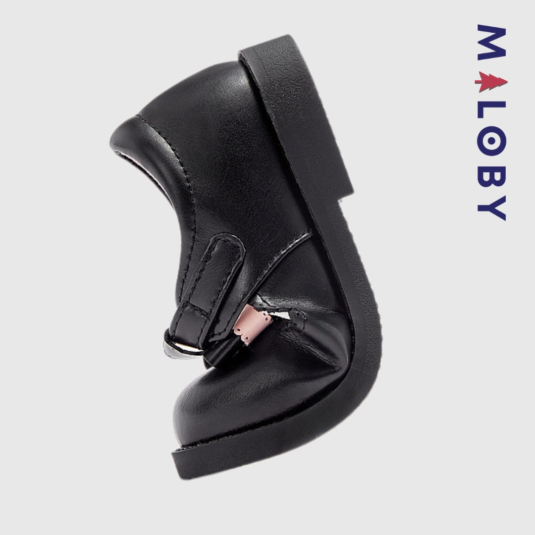 Chaussures noires à nœud pour filles, parfaites pour les anniversaires et les occasions spéciales.