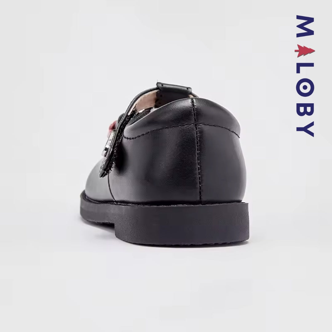 Chaussures noires à nœud pour filles, parfaites pour les anniversaires et les occasions spéciales.