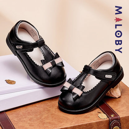 Chaussures noires à nœud pour filles, parfaites pour les anniversaires et les occasions spéciales.
