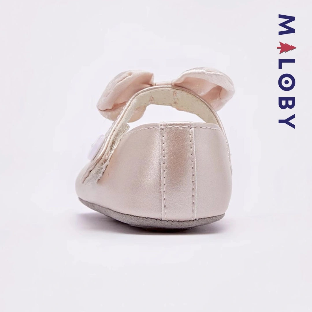 Chaussures premières pas nœud floral pour filles, parfaites pour les célébrations et la mode enfantine.