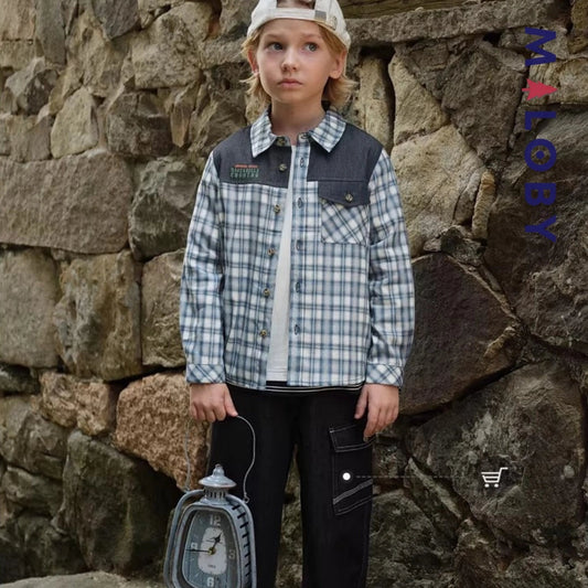 Chemise à carreaux bleu pour enfant garçon, idéale pour les occasions spéciales et les anniversaires.