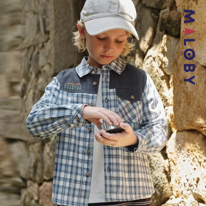 Chemise à carreaux bleu pour enfant garçon, idéale pour les occasions spéciales et les anniversaires.
