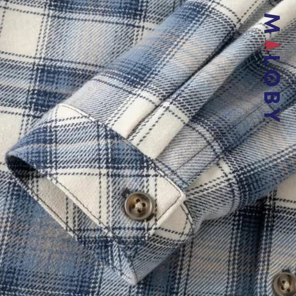 Chemise à carreaux bleu pour enfant garçon, idéale pour les occasions spéciales et les anniversaires.