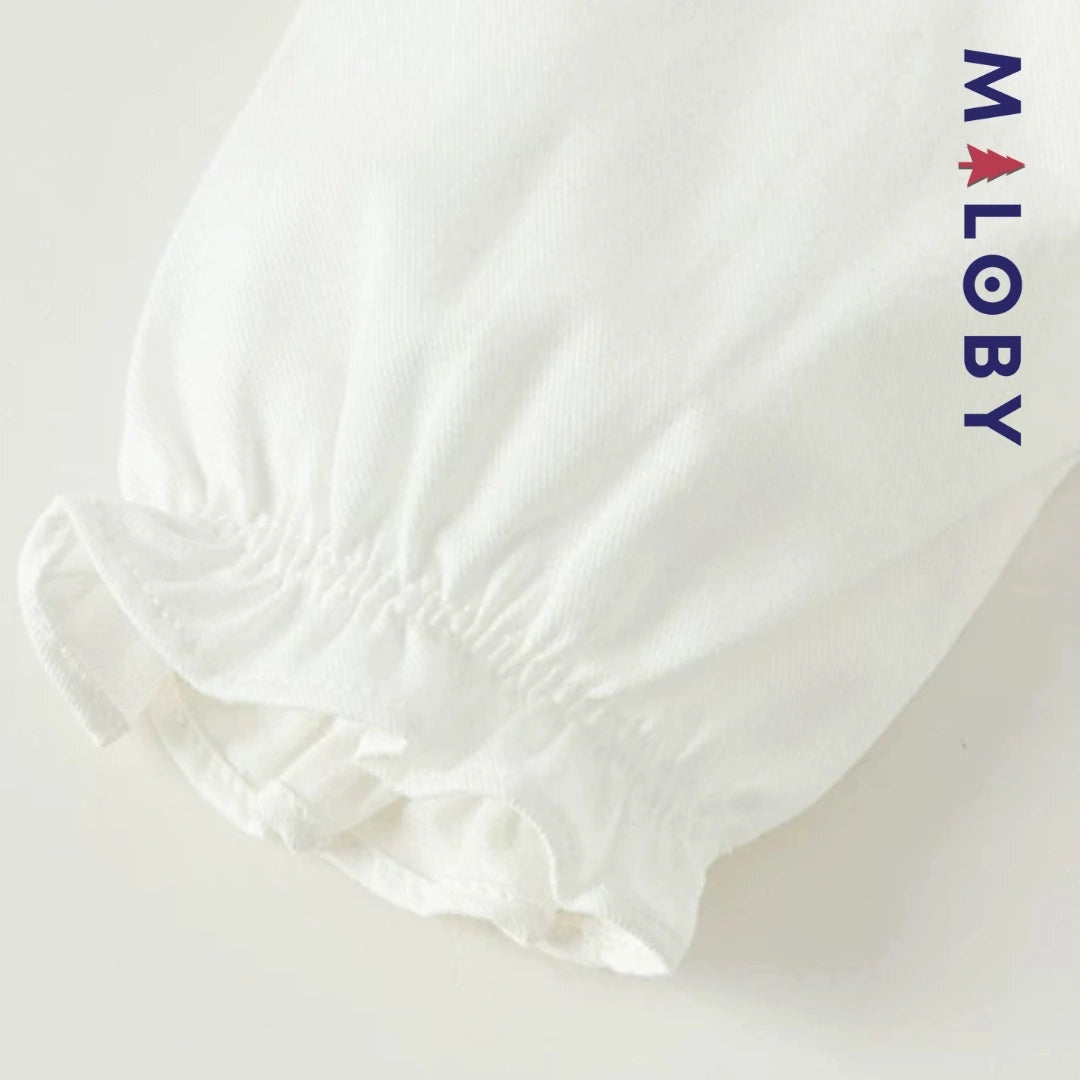 Chemise col claudine blanc pour fille, idéale pour les événements et les anniversaires.
