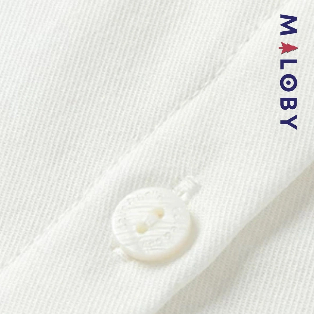 Chemise col claudine blanc pour fille, idéale pour les événements et les anniversaires.