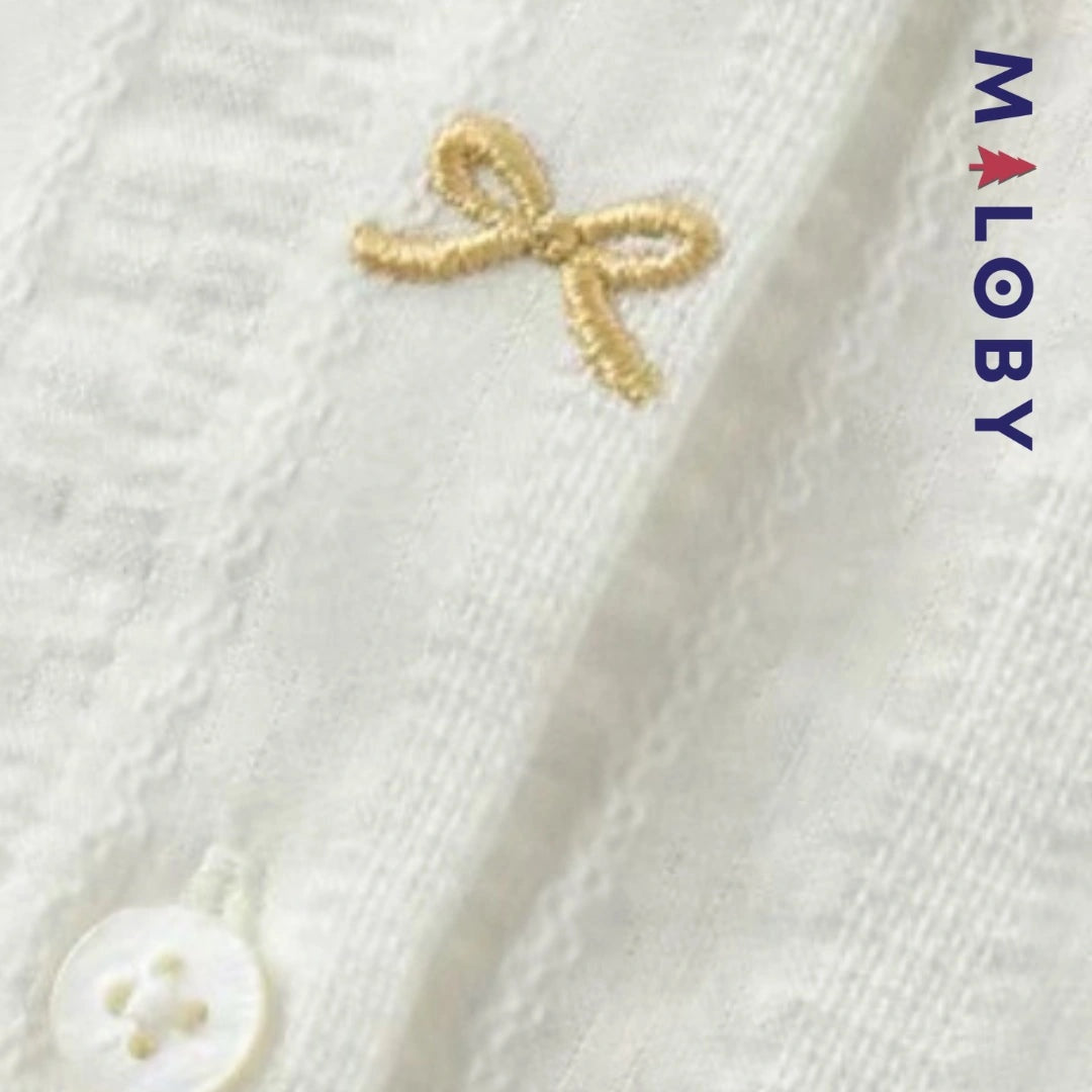 Chemise col claudine blanche en pur coton pour fille, idéale pour occasions spéciales.