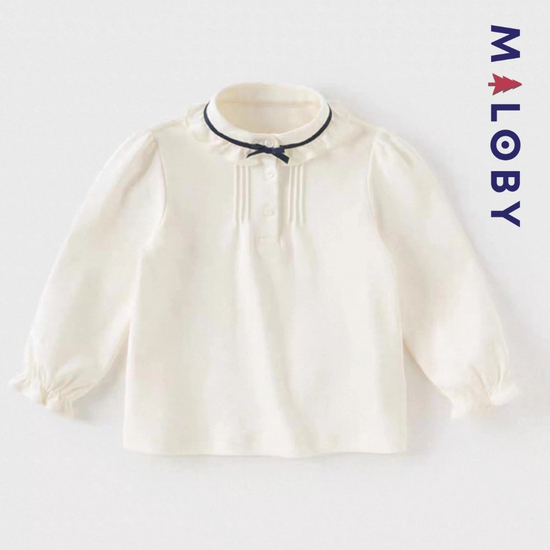 Chemise col volantée en pur coton pour fille, idéale pour les occasions spéciales et le quotidien.