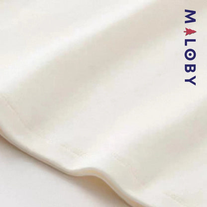 Chemise col volantée en pur coton pour fille, idéale pour les occasions spéciales et le quotidien.
