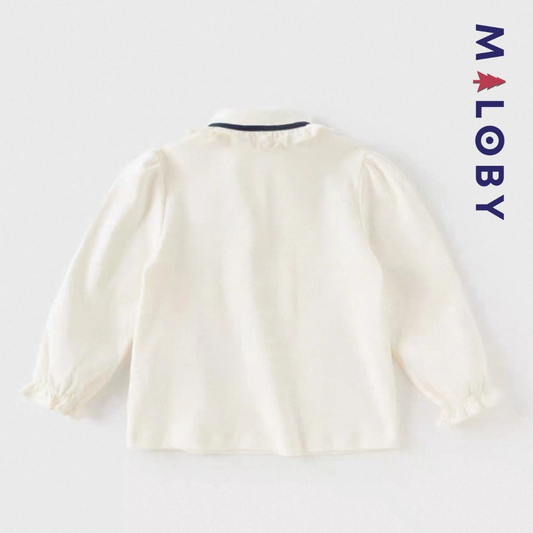 Chemise col volantée en pur coton pour fille, idéale pour les occasions spéciales et le quotidien.