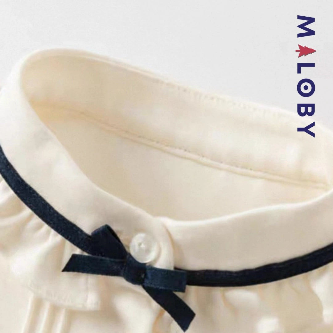 Chemise col volantée en pur coton pour fille, idéale pour les occasions spéciales et le quotidien.
