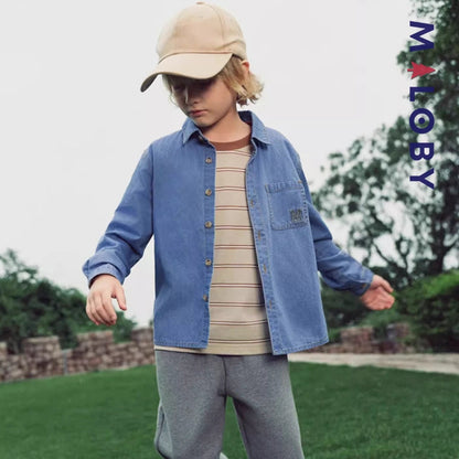 Chemise en jean enfant garçon de la marque MALOBY, idéale pour toutes les occasions