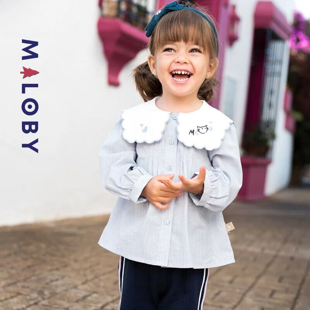 Chemise à carreaux pour fille en blanc et bleu, idéale pour les vêtements enfants au Maroc.
