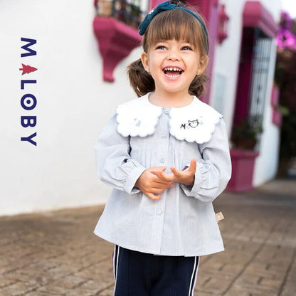 Chemise à carreaux pour fille en blanc et bleu, idéale pour les vêtements enfants au Maroc.