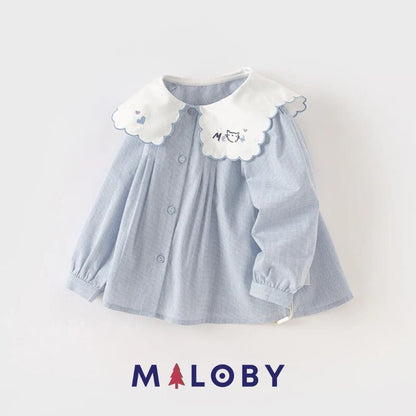 Chemise à carreaux pour fille en blanc et bleu, idéale pour les vêtements enfants au Maroc.
