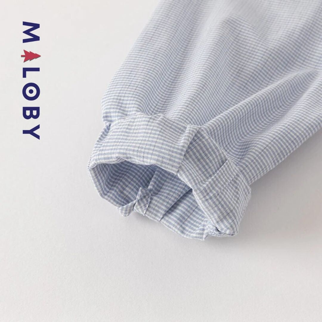 Chemise à carreaux pour fille en blanc et bleu, idéale pour les vêtements enfants au Maroc.