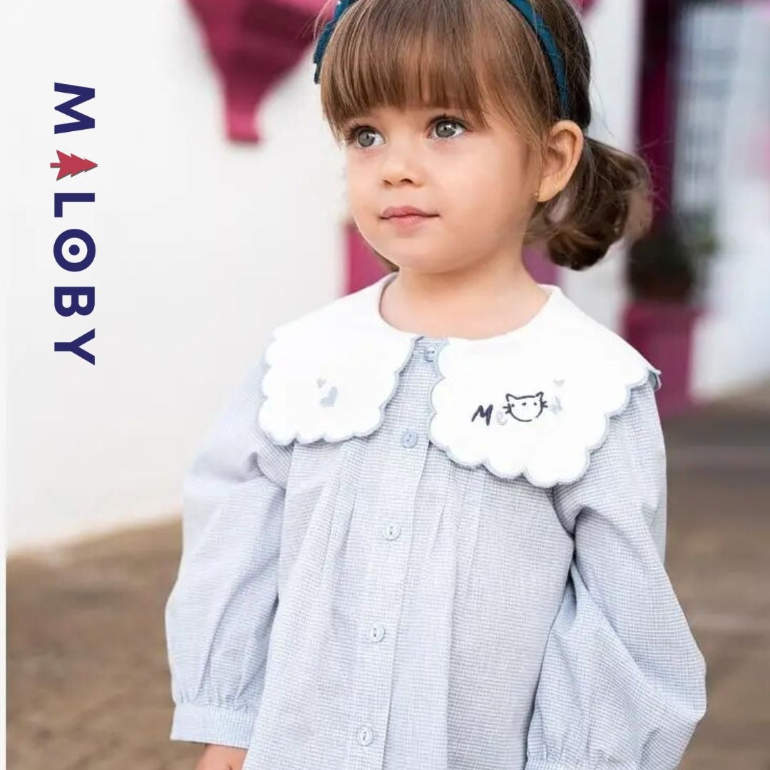 Chemise à carreaux pour fille en blanc et bleu, idéale pour les vêtements enfants au Maroc.