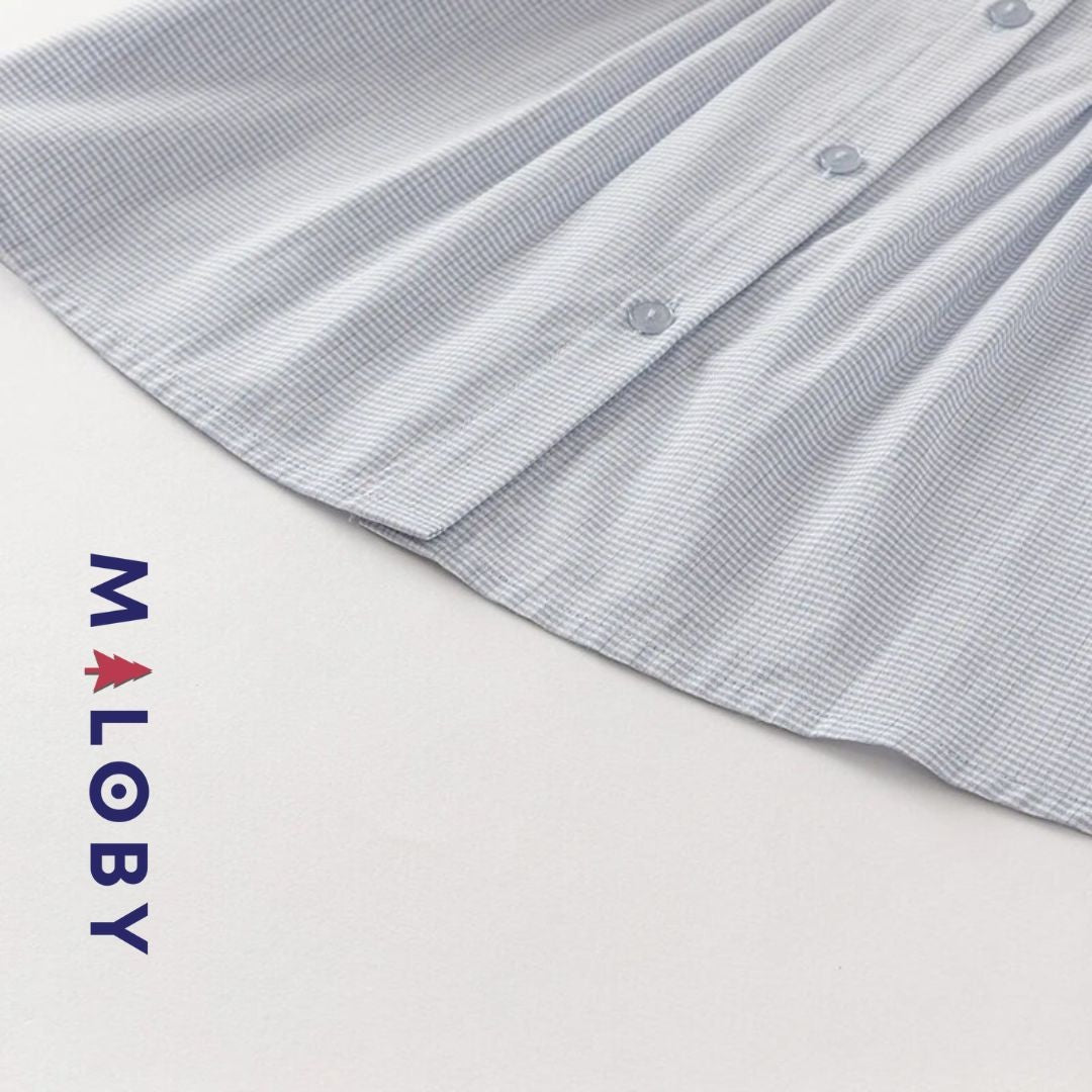 Chemise à carreaux pour fille en blanc et bleu, idéale pour les vêtements enfants au Maroc.