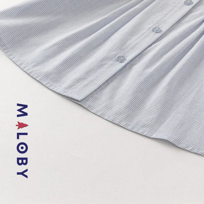 Chemise à carreaux pour fille en blanc et bleu, idéale pour les vêtements enfants au Maroc.