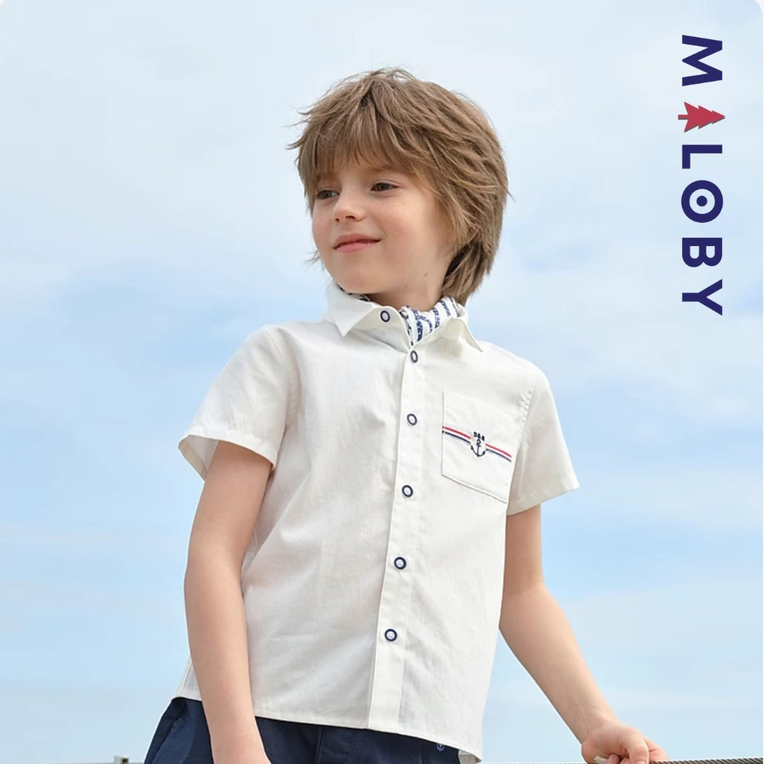 Chemise blanche motifs marins pour garçon, parfaite pour les fêtes et occasions spéciales.