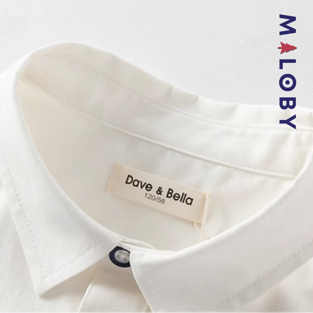 Chemise blanche motifs marins pour garçon, parfaite pour les fêtes et occasions spéciales.